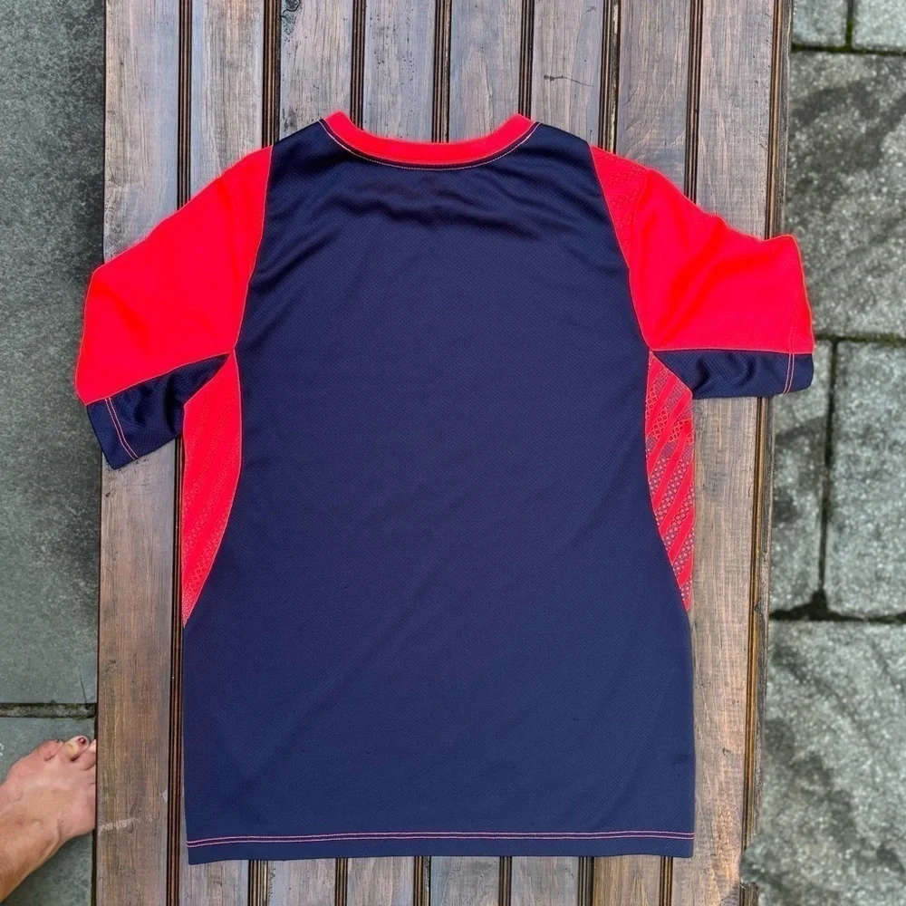Boys Oshkosh dry-fit tee.